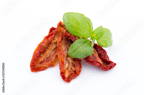 Dried tomatoes isolated on white background.