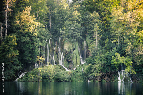 Fototapeta Naklejka Na Ścianę i Meble -  Beautiful green forest waterfall