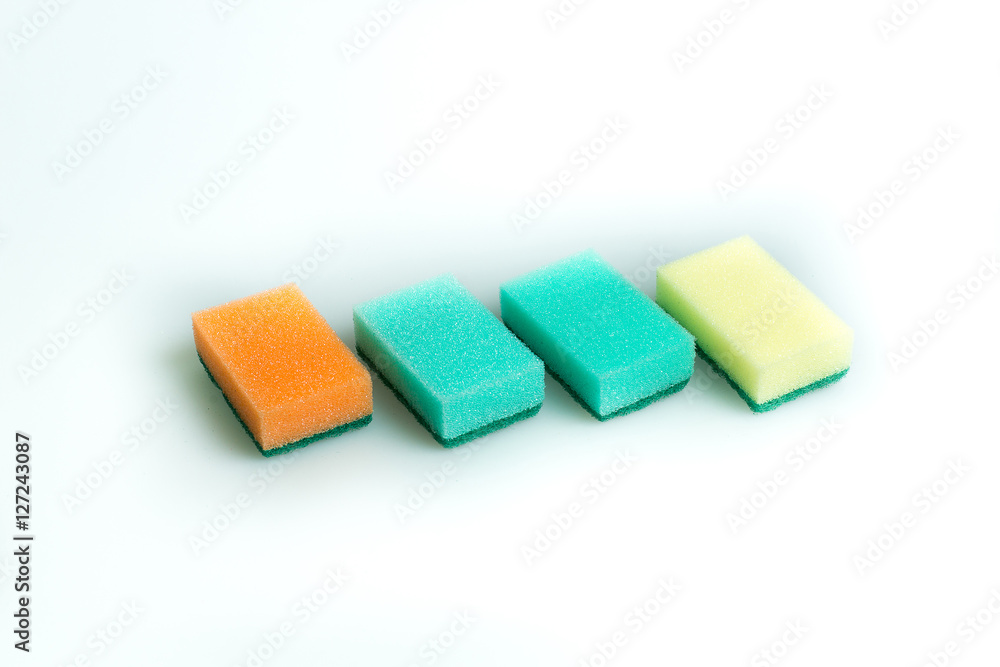 Sponges for washing close-up on the table. Fight with dirt. Cannon Housewives. Sponges for washing close-up on the table. Fight with dirt. Cannon Housewives.