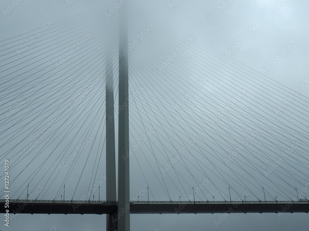 Detail of golden bridge in the fog. Vladivostok. Russia Detail of golden bridge in the fog. Vladivostok. Russia