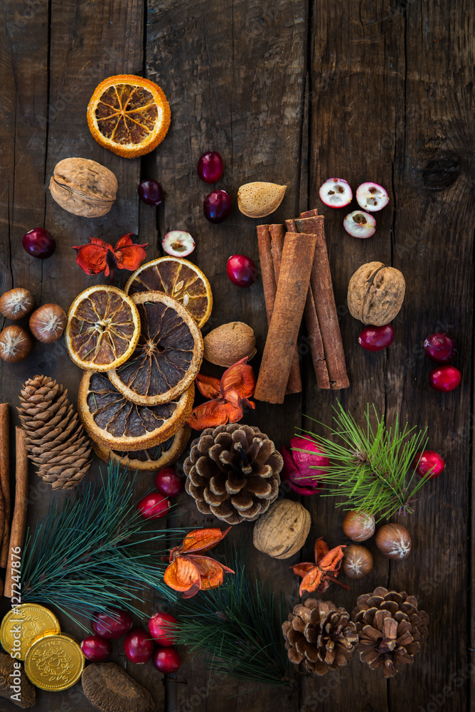 Xmas Symbols such as nuts, orange slices, tree branches, cranber Xmas Symbols such as nuts, orange slices, tree branches, cranber