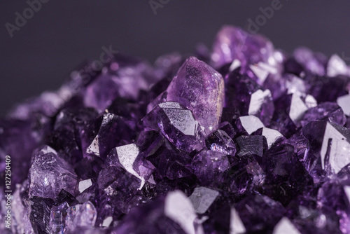 Fotografie Amethyst geode on black background
