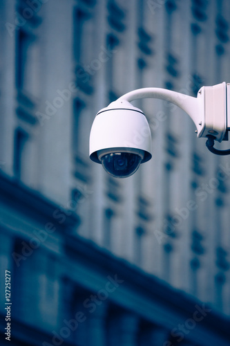 CCTV surveillance camera mounted on office building