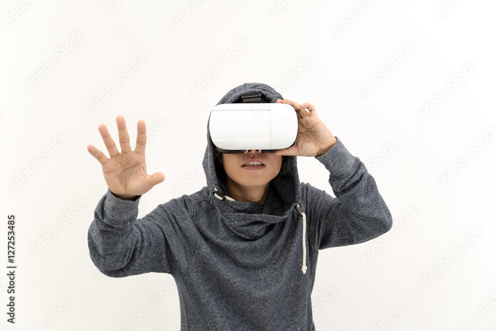 isolated man using VR glasses on white background isolated man using VR glasses on white background