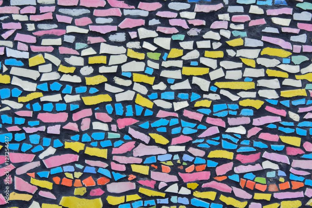 Decorative wall with colorful cracked tiles for mosaic background Stock