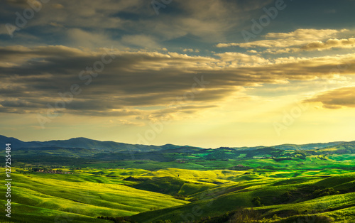 Tuscany panorama  rolling hills and green fields on sunset. Italy