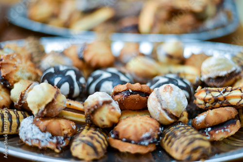 Cookies with cream on the table in natural light