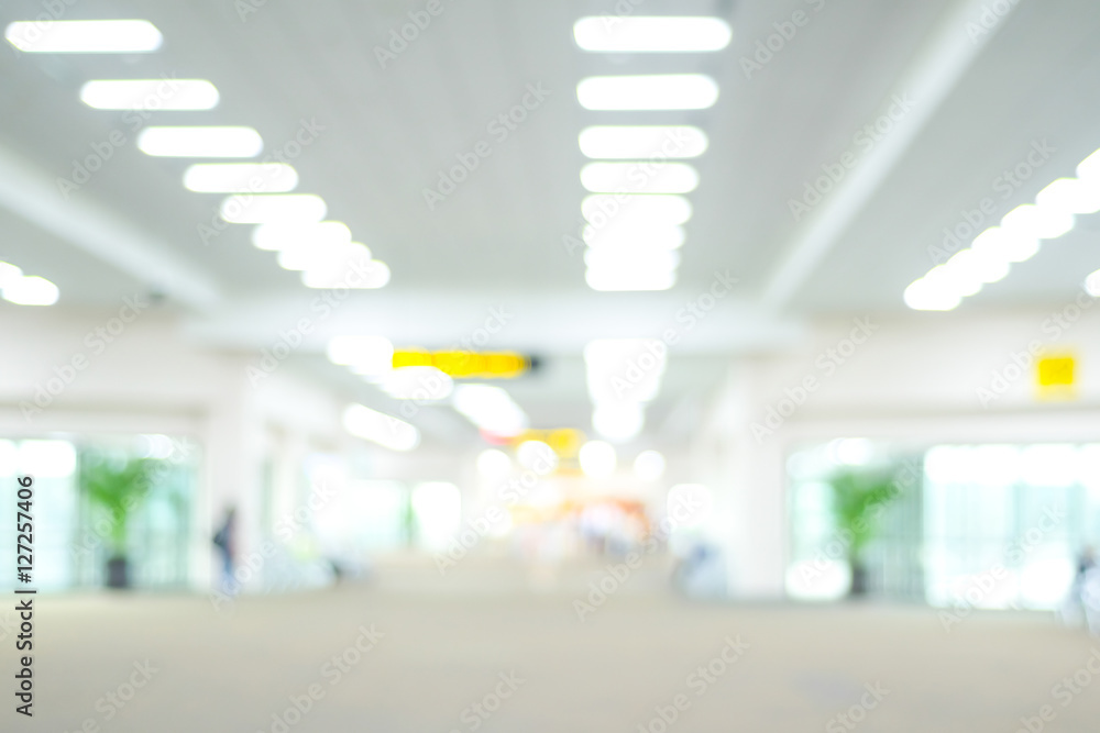 Blurred airport terminal with bokeh light background