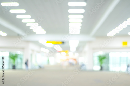 Blurred airport terminal with bokeh light background