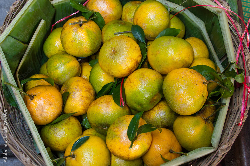 Fresh orange group in basket in market