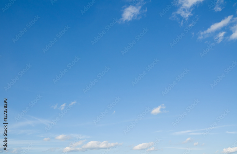 Clouds flying against blue sky. Sky with clouds over horizon. Clouds flying against blue sky. Sky with clouds over horizon.