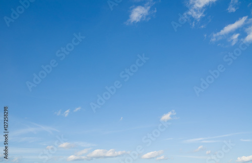 Clouds flying against blue sky. Sky with clouds over horizon.