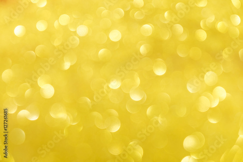 Abstract bokeh of golden glitter background