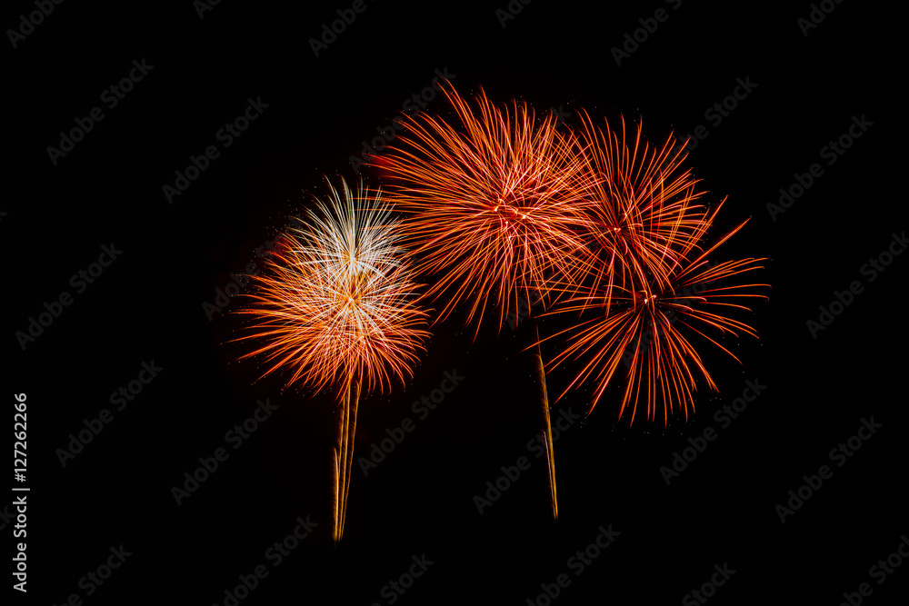 Fireworks in the night.New Year celebration fireworks,Colorful fireworks over dark sky, displayed during a celebration event