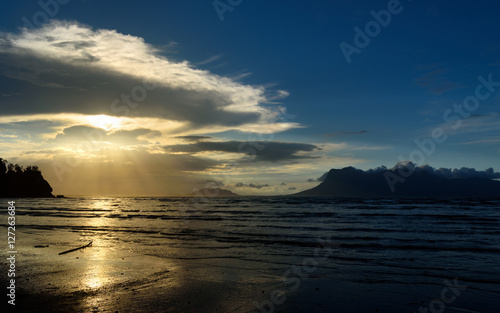 Tropical beach at low tide. sunset