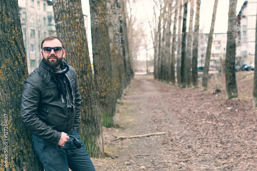beard man in park with headphon © alexkich