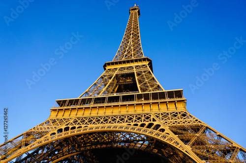 Close up Eiffel Tower in sunny summer day with the clear blue sky background...Paris,France 