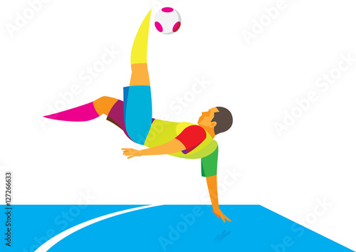 Young Soccer player falling kicking the ball