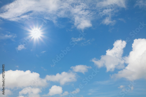 Blue sky with clouds summer background.