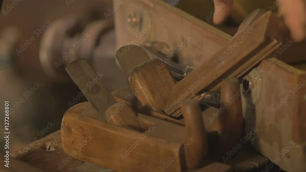 male worker puts things in order in his workshop after work , 4K male worker puts things in order in his workshop after work , 4K