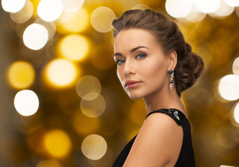 woman in evening dress and earring