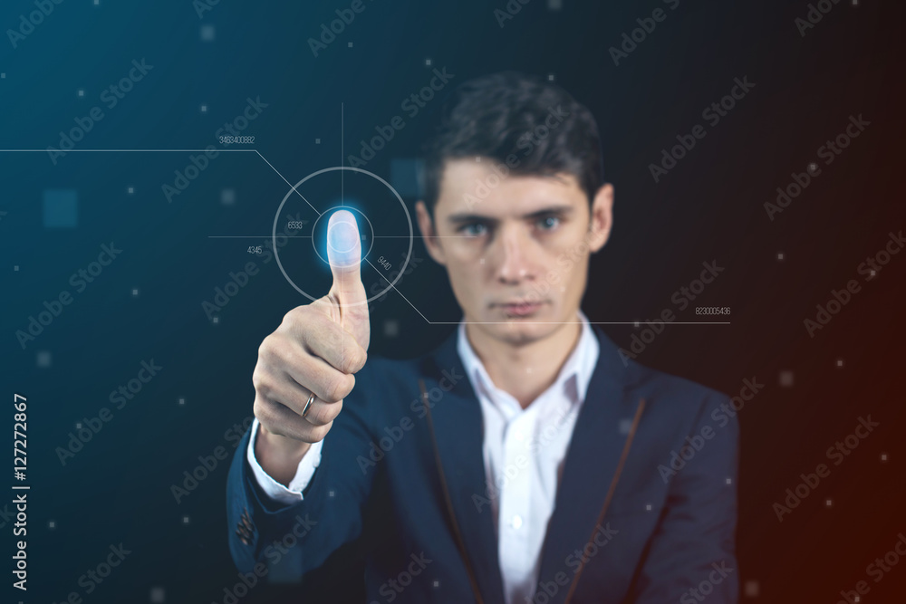 Man passing biometric verification with fingerprint scanner Man passing biometric verification with fingerprint scanner
