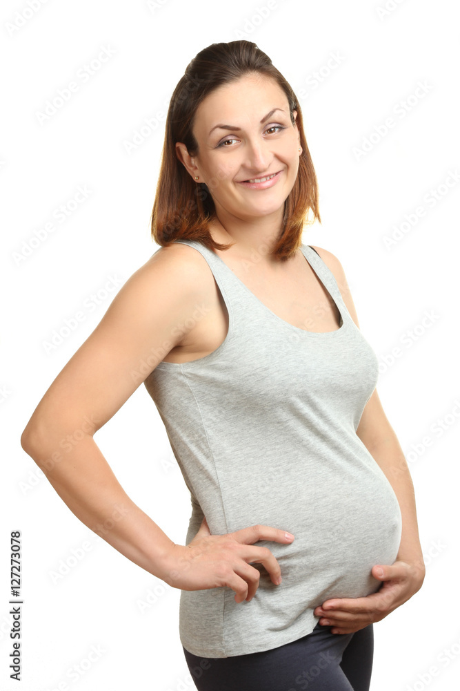 Young happy pregnant woman, isolated on white background Young happy pregnant woman, isolated on white background