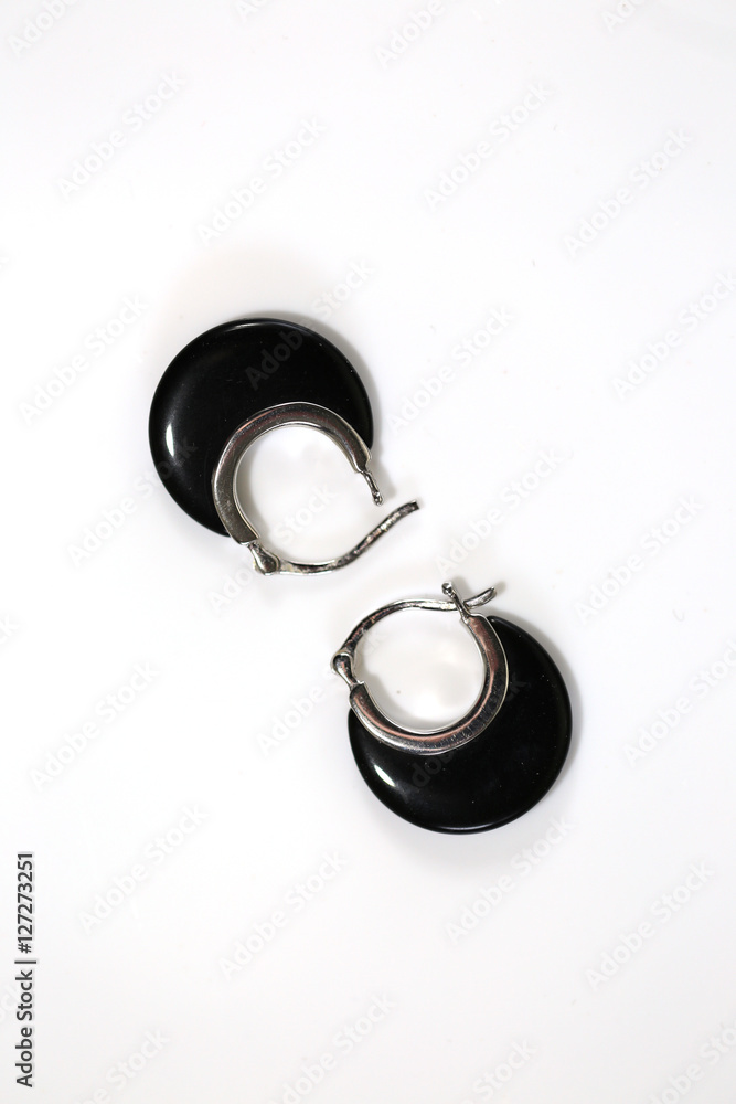 earrings of black onyx isolated on white background earrings of black onyx isolated on white background