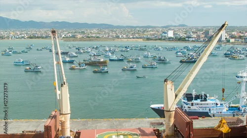 Manta Ecuador Harbour with Fishing Boats in the Pacific Ocean Bay with City Buildings and Mountains in the Background