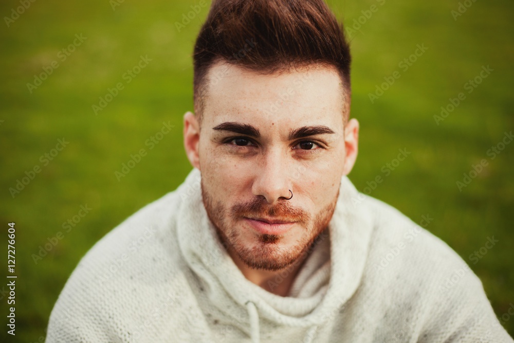 Attractive guy with beard in the meadow Attractive guy with beard in the meadow