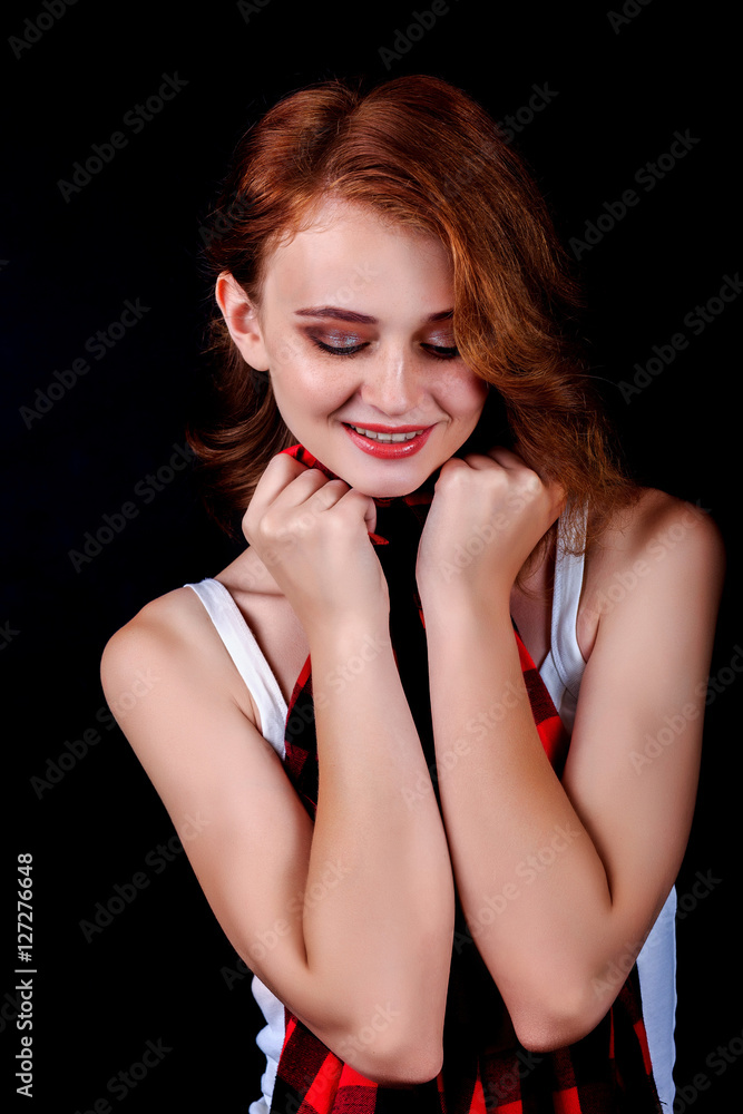 Portrait of beautiful girl. Freckled woman with wavy red hair an Portrait of beautiful girl. Freckled woman with wavy red hair an