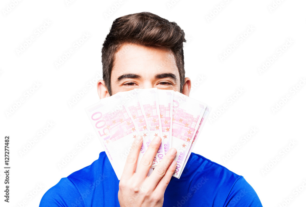 Fotografie young man holding bills