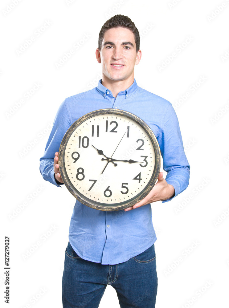 Happy young man holding a clock Happy young man holding a clock