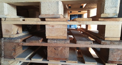 wooden pallets overlap in warehouse