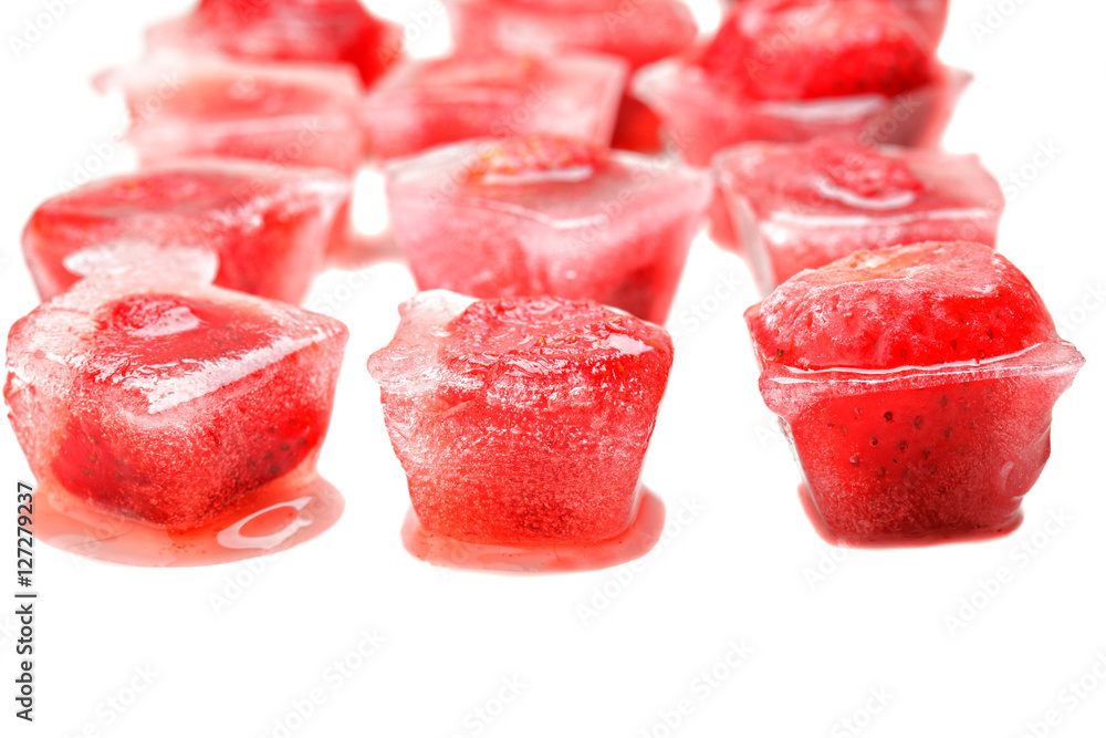 Three rows of strawberries in ice