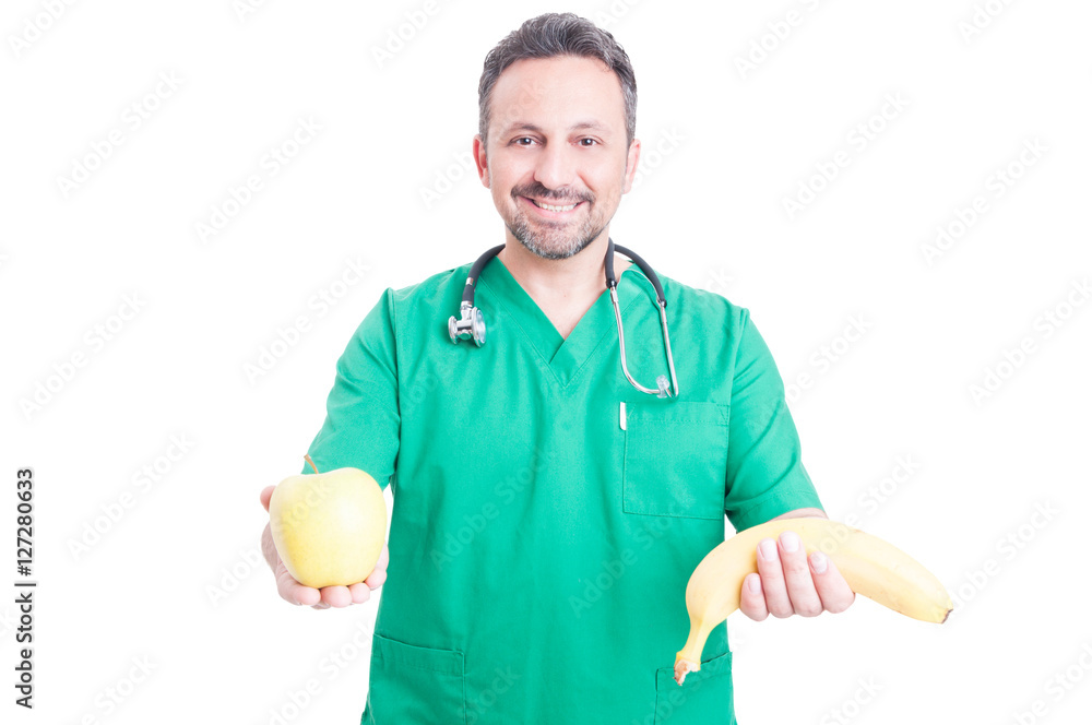 Trustworthy doctor offering fruits to you Trustworthy doctor offering fruits to you