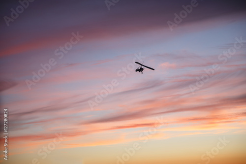 Hang glider flying with pilot
