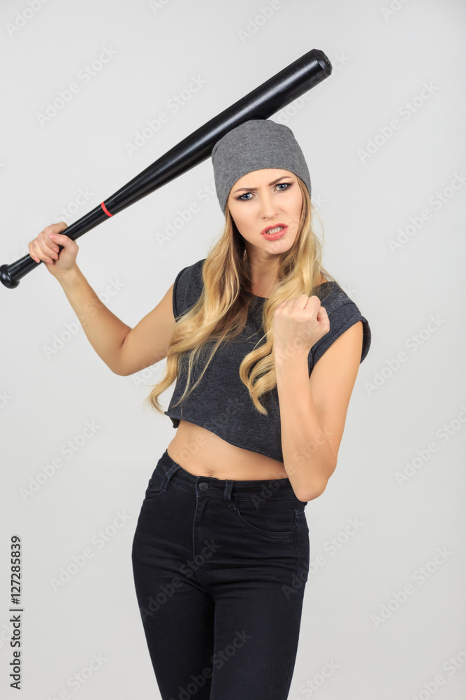 Cool hot fashionable woman bandit dressed in hat with baseball b Cool hot fashionable woman bandit dressed in hat with baseball b
