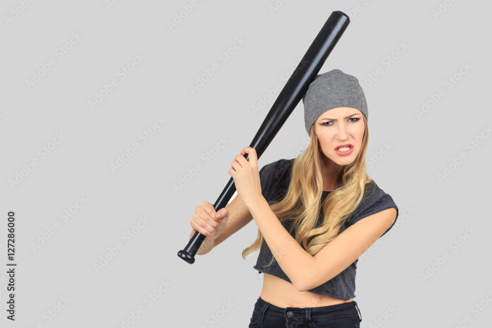 Cool hot fashionable woman bandit dressed in hat with baseball b