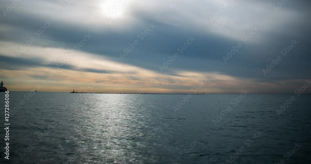 Chicago, Illinois, USA - view from Navy Pier facing Lake Michigan with lighthouse and boats after sunrise - Timelapse with zoom in Chicago, Illinois, USA - view from Navy Pier facing Lake Michigan with lighthouse and boats after sunrise - Timelapse with zoom in
