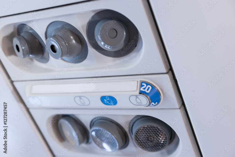 Overhead console in the passenger airplane Overhead console in the passenger airplane