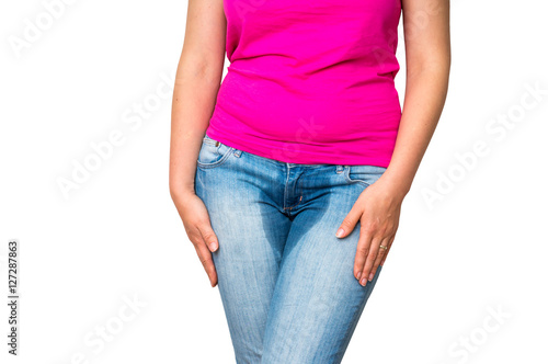 Valokuva Woman with hands holding her crotch - incontinence concept