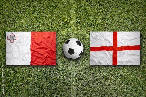 Malta vs. England flags on soccer field