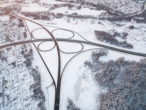 winter road junction in the countryside aerial view in the form of butterfly