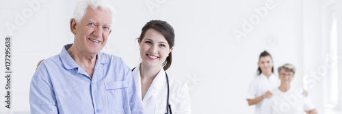 Young doctor and senior patient