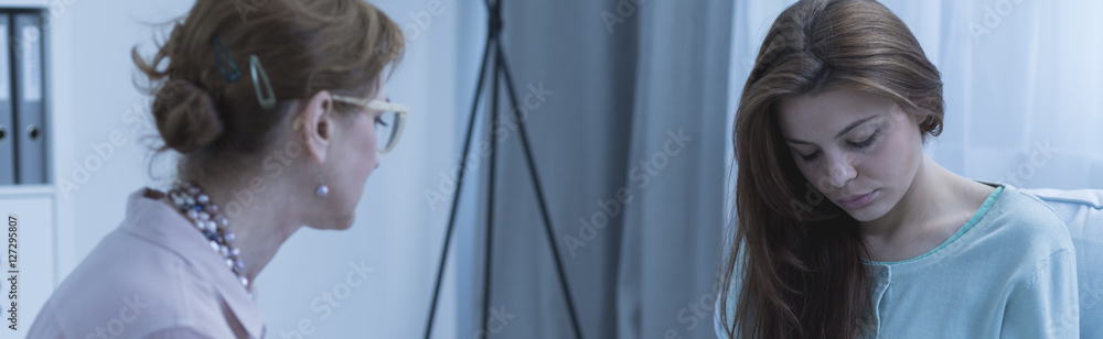 Therapist during session with patient Therapist during session with patient