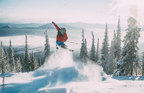 Skier jumping photo