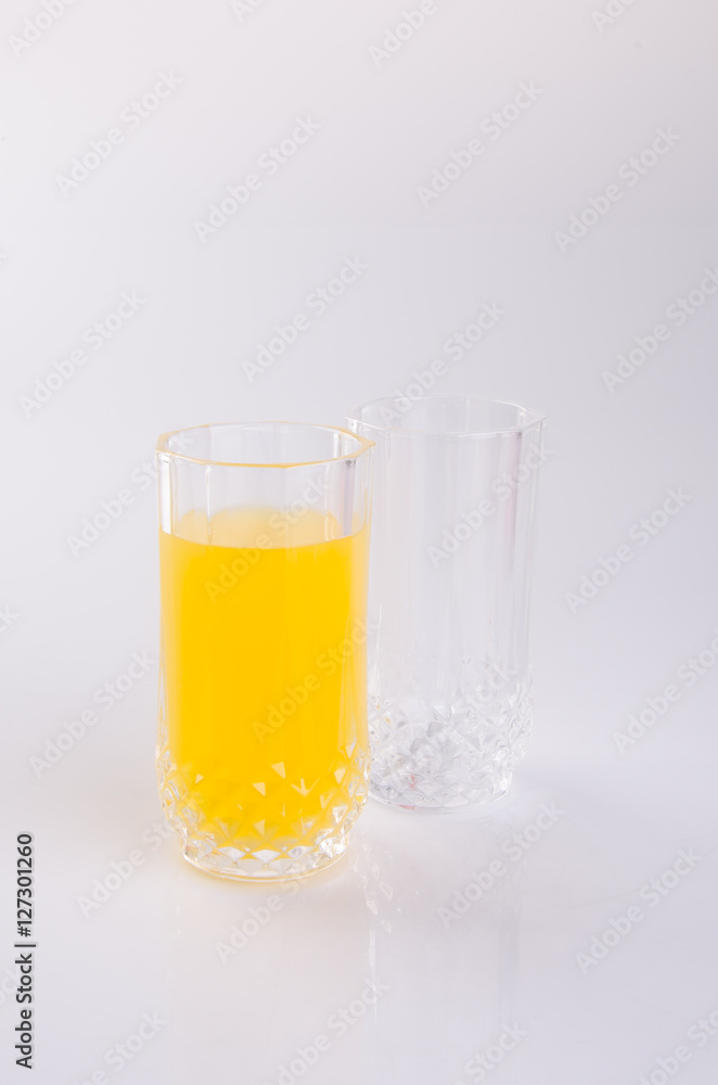 Orange juice in glasses on white background. Orange juice in glasses on white background.