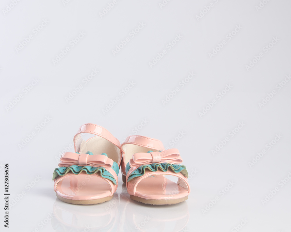 shoe or beautiful little girl shoes on a background. shoe or beautiful little girl shoes on a background.
