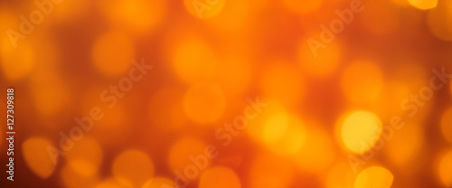 Colorful golden orange sparkling party lights